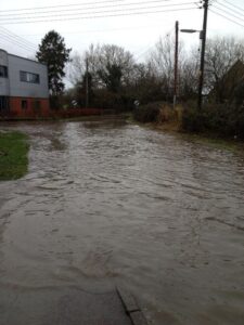 The Maples Berkeley Homes access Alfold Road Flooding 2103